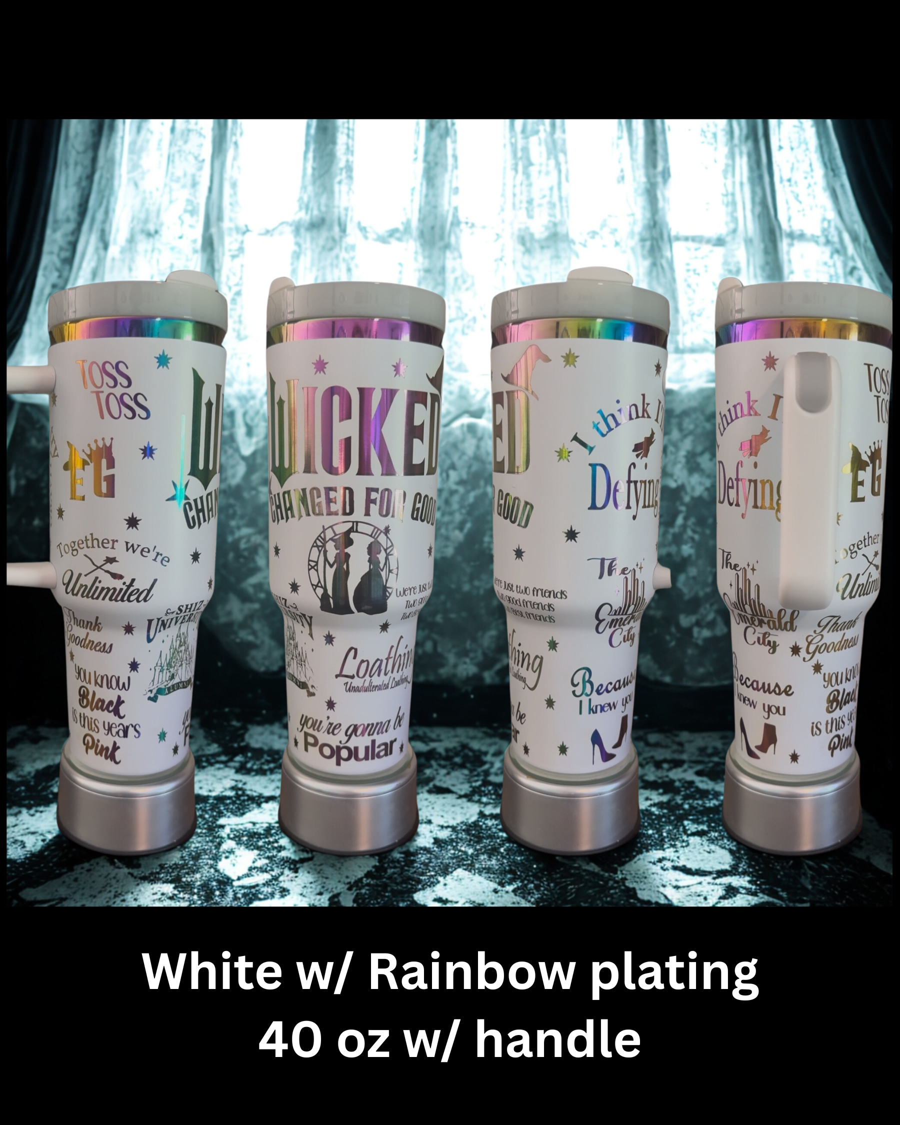 Four white and rainbow-plated 40 oz w/ handle travel mugs, each with various sayings and designs printed on them.